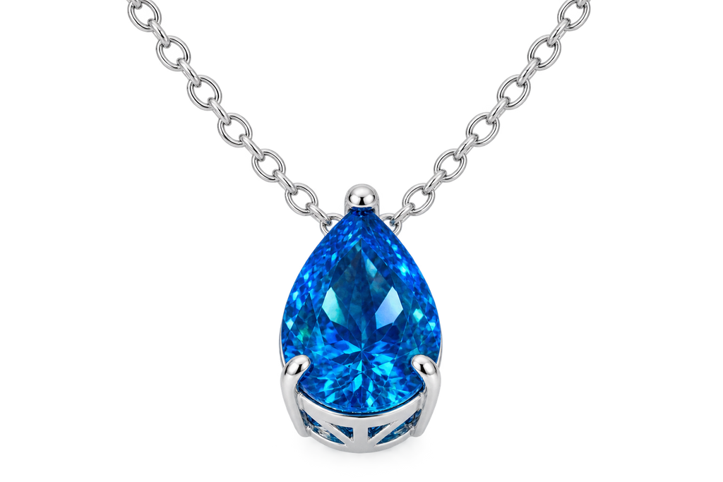 Silver-tone necklace with vivid blue pear-cut cubic zirconia pendant on black
