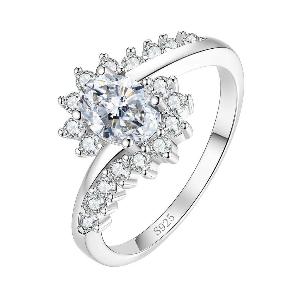 The Sunburst sterling silver moissanite ring on white — oval centre stone, radiating stones, crossover band stamped S925