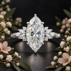 The Marquise sterling silver moissanite ring standing on a dark surface, 7 × 14 mm centre stone
