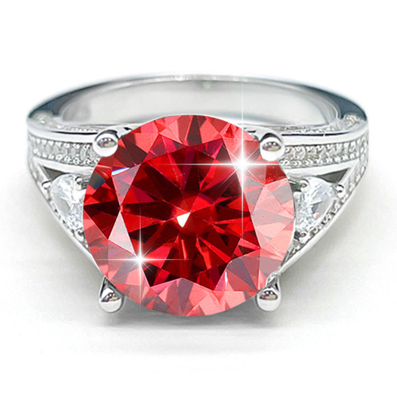 Red-orange 5 ct round-cut moissanite sterling silver ring