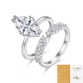 The Marquise Cluster Set: marquise-cut moissanite, 7 × 14 mm with a band set with small marquise and round moissanite accents — sterling silver moissanite two-ring set