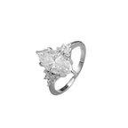 Marquise moissanite ring in sterling silver, angled side view showing the six-prong setting