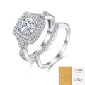 The Cushion Halo Set: 6.5 mm round moissanite in a cushion double halo with a matching pavé band — sterling silver two-ring set